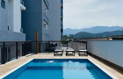 Ubatuba, centro, apartamento com 02 dormitórios sendo 01 suíte com área de lazer.