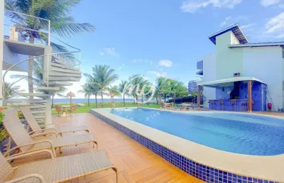 Itacimirim|apartamento com terraço 73m²| 2 suítes|1 vaga| mobiliado| pé na areia