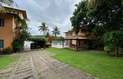 Casa sensacional a venda proximo a meaipe com acesso direto a lagoa .