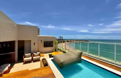 Cobertura espetacular de 4 quartos à venda na praia de peracanga – vista para o mar com lazer completo