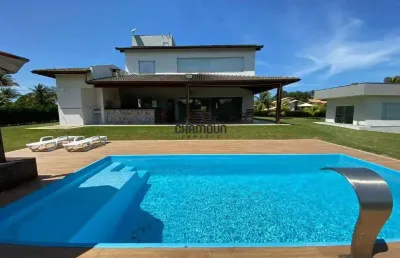 Casa em condomínio com 5 suítes e área de lazer completa para venda em guarapari/es.