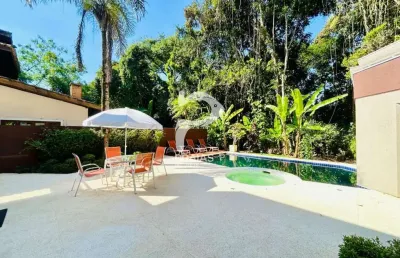 Casa em condomínio fechado com 5 quartos à venda na alameda do sereno, --, riviera, bertioga por r$ 4.850.000