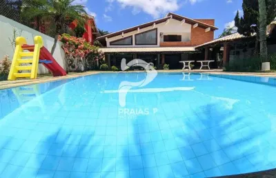 Casa em condomínio fechado com 5 quartos à venda na amadeu fernandes conde (rua 21), --, jardim acapulco, guarujá por r$ 3.100.000