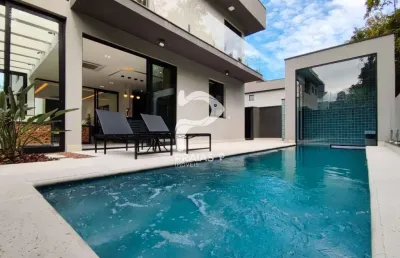 Casa em condomínio fechado com 5 quartos à venda na alameda de são miguel, --, riviera, bertioga por r$ 6.500.000