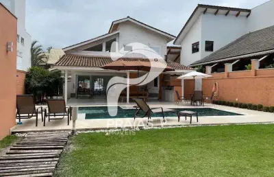 Casa em condomínio fechado com 3 quartos à venda na alameda do afoxe, --, riviera, bertioga por r$ 6.200.000