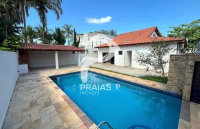 Casa em condomínio fechado com 4 quartos à venda na rua vinte, --, jardim acapulco, guarujá por r$ 1.500.000