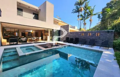 Casa em condomínio fechado com 5 quartos à venda na alameda do serrado, --, riviera, bertioga por r$ 7.500.000