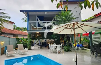 Casa em condomínio fechado com 5 quartos à venda na alameda das pitangas, --, riviera, bertioga por r$ 3.000.000