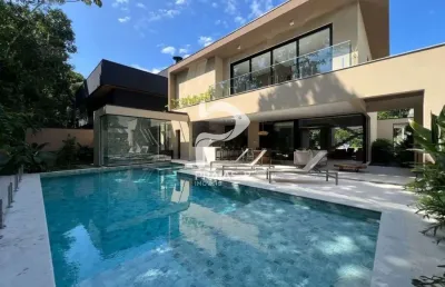 Casa em condomínio fechado com 5 quartos à venda na alameda mindoro, --, riviera, bertioga por r$ 7.800.000