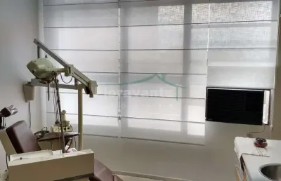 Sala comercial e vaga de garagem escrituradas no centro, santos