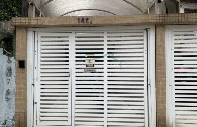 Casa com 4 quartos à venda na Rua Paraná, Vila Mathias, Santos
