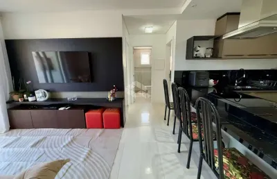 Apartamento mobiliado com 2 quartos sendo 1 suíte e 1 vaga de garagem no bairro trindade em florianópolis/sc