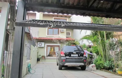 Excelente casa 3 dormitórios com uma suíte, 2 vagas de garagem e piscina à venda no guarujá.