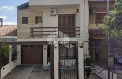 Casa com 3 quartos à venda na Rua Attilio Bettio, 60, Aberta dos Morros, Porto Alegre