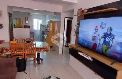 Apartamento com 2 quartos, 1 suíte , 1 banheiro social e garagem.