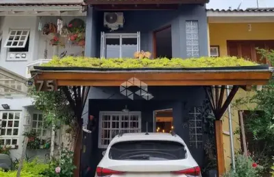 Casa em condomínio fechado com 3 quartos à venda na Avenida Juca Batista, 1458, Cavalhada, Porto Alegre