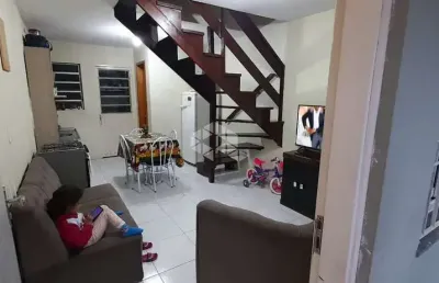 Sobrado de 2 quartos uma vaga de garagem com entrada coletiva de 71m , churrasqueira coletiva no pátio no bairro cidade nova