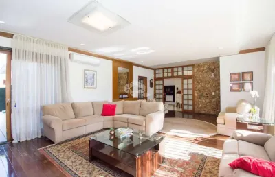 Casa térrea com 4 dormitórios no bairro assunção  porto alegre