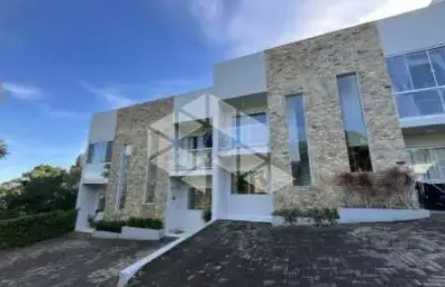 Sobrado duplex semimobiliado à venda no bairro rondônia, novo hamburgo
