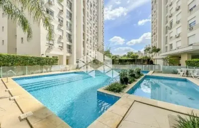 Apartamento semimobiliado em andar alto, 2 dormitórios, 1 suíte, living com 2 ambientes, sacada, 1 vaga