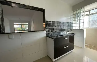 Apartamento com 2 dormitórios, sacada, garagem escriturada - bairro tristeza