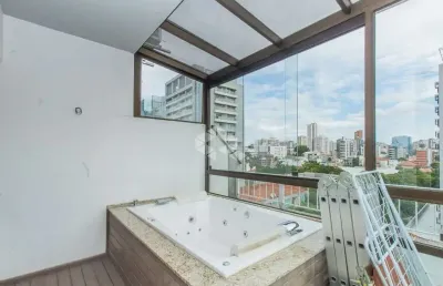 Cobertura no bairro auxiliadora, com duas vagas e linda vista