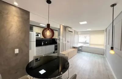 Apartamento mobiliado com 1 dormitório com suíte e vaga coberta  coberta -centro