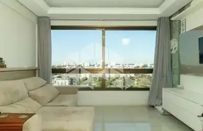 Apartamento  2 dormitórios, sendo 1 suíte, semimobiliado, lareira e churrasqueira.