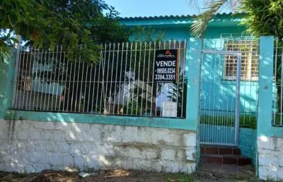 Casa térrea 4 quartos, pátio, edícula e churrasqueira para venda no bairro nonoai