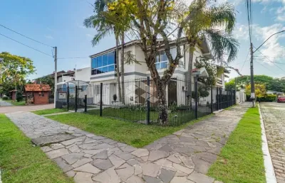Casa com 4 quartos à venda na Rua Adão Pinheiro da Silva, 140, Ipanema, Porto Alegre