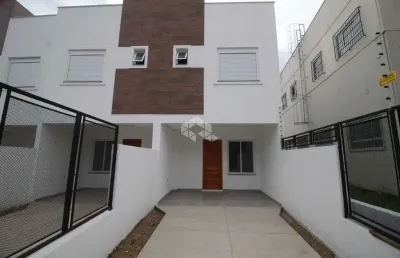 Casa em condomínio 2 quartos, 1 suíte e 2 vagas de garagem no bairro nonoai