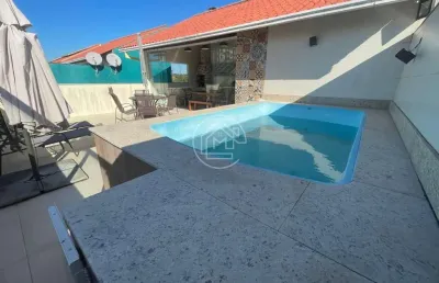 Triplex com 3 quartos sendo 1 com suíte e área gourmet com piscina
