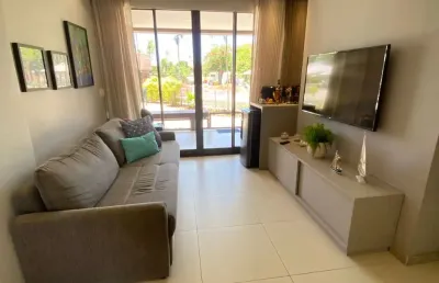 Flat alto padrão em muro alto – mobiliado, nascente e com 2 vagas!