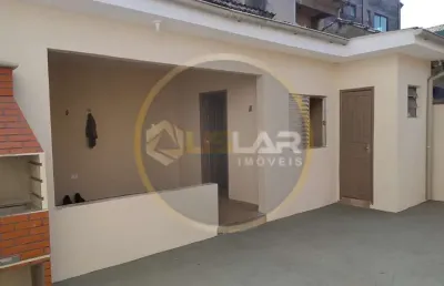 Casa térrea com edícula na ponta da praia em santos