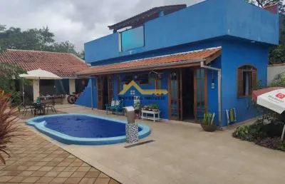 À venda i0895 - casa 3 dormitórios no massaguaçu caraguatatuba/sp