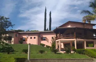 Maravilhosa casa no condomínio chamonix térrea para venda possui 406 metros quadrados com 4 suítes