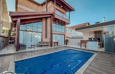 Casa em condomínio fechado com 4 quartos à venda na alameda garoupa, 218, alphaville, santana de parnaíba por r$ 3.195.000
