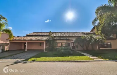 Casa em condomínio fechado com 4 quartos para alugar na alameda dourado, 293, alphaville, santana de parnaíba por r$ 24.000