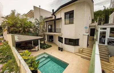Casa em condomínio fechado com 3 quartos à venda na alameda dos girassóis, 343, alphaville, santana de parnaíba por r$ 4.000.000