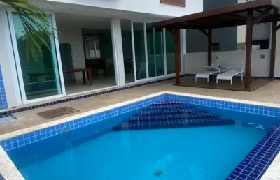 Alphaville salvador linda casa com espaço gormet 5 suítes sendo uma térrea