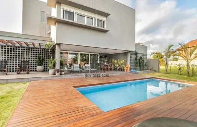 Imóvel de luxo: casa em condomínio com 4 suítes e 478m² em belém novo, porto alegre-rs. agende sua visita agora!