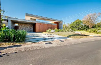 Casa em condomínio fechado com 4 quartos à venda na avenida juca batista, 8000, belém novo, porto alegre, 389 m2 por r$ 4.450.000