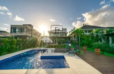 Casa em condomínio fechado com 4 quartos à venda na avenida juca batista, 8000, belém novo, porto alegre, 351 m2 por r$ 3.500.000