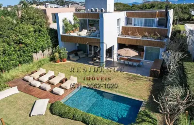 Casa em condomínio fechado com 4 quartos à venda na avenida central, 2500, centro, xangri-lá, 540 m2 por r$ 6.500.000