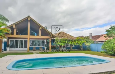 Casa em condomínio fechado com 3 quartos à venda na avenida juca batista, 8000, belém novo, porto alegre, 358 m2 por r$ 1.950.000