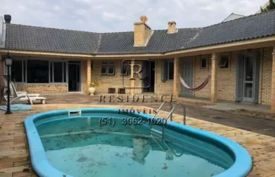 Casa com 3 quartos à venda na rua bagé, 623, niterói, canoas, 235 m2 por r$ 1.100.000