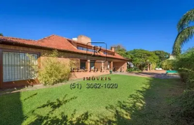 Casa com 5 quartos à venda na rua landel de moura, 167, tristeza, porto alegre, 418 m2 por r$ 3.900.000