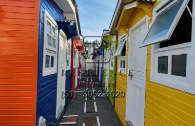 Propriedade única à venda em porto alegre - partenon: 30 quartos, 2 salas, 29 banheiros, 300m². terreno com 29 jk's, cozinha compartilhada, próximo à pucrs.