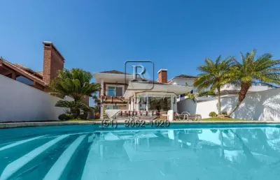 Casa em condomínio fechado com 3 quartos à venda na avenida juca batista, 8000, belém novo, porto alegre, 338 m2 por r$ 3.500.000