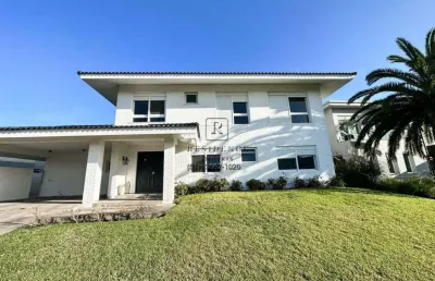 Casa em condomínio fechado com 5 quartos à venda na avenida juca batista, 8000, belém novo, porto alegre, 403 m2 por r$ 2.800.000